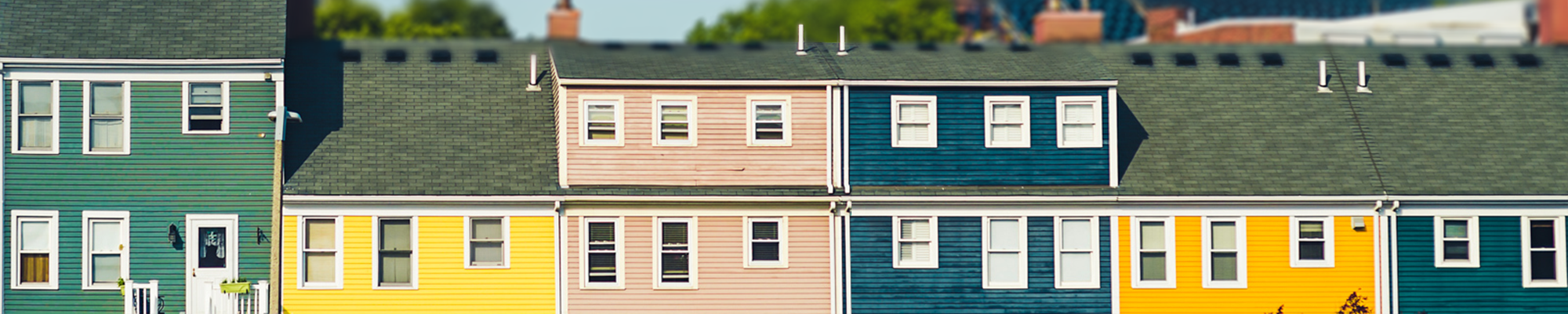 A row of colorful town houses