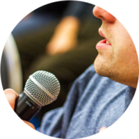 Self-Advocacy session icon: Close-up of person speaking into microphone