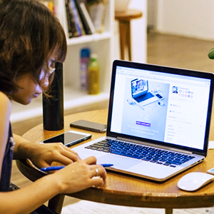 Woman working on laptop