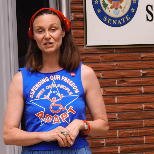 Woman standing on the street advocating