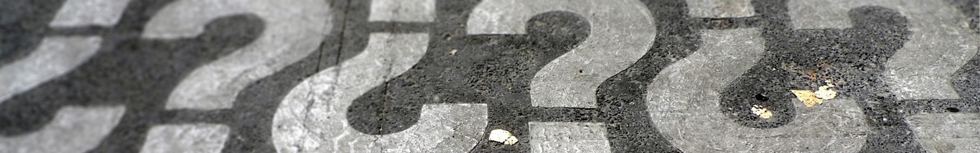 Building Support session banner with question marks painted onto the road.