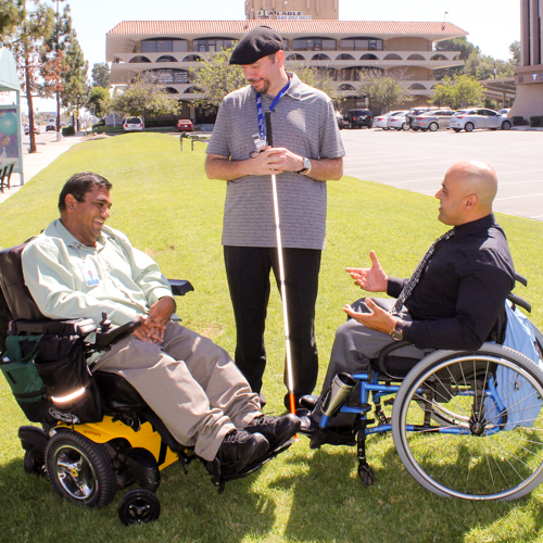 Three people having a conversation