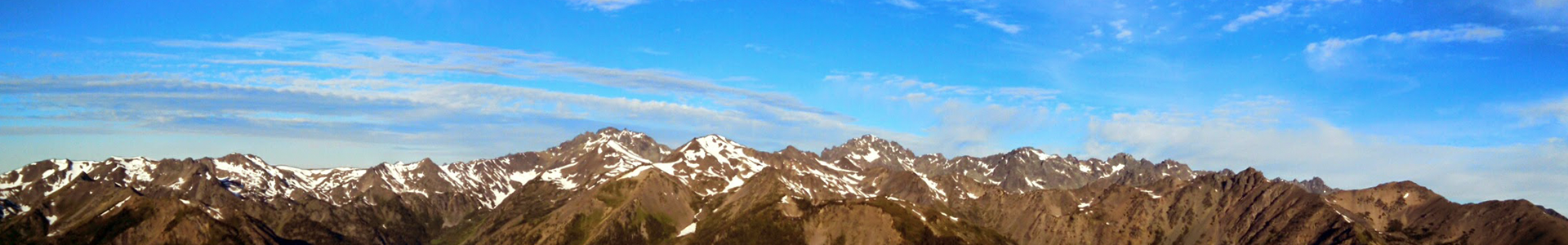 Facilitator Overview banner: Rugged mountaintops with a blue sky in the background