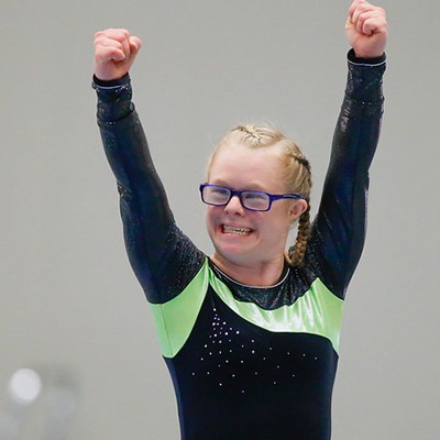 Gymnast with Down's Syndrome pumps her fists in the air